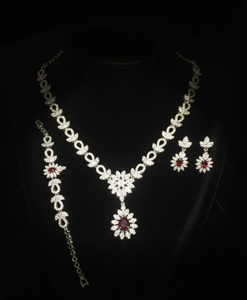 "Regal Blossom Set – 925 Silver with Deep Red Gemstones"